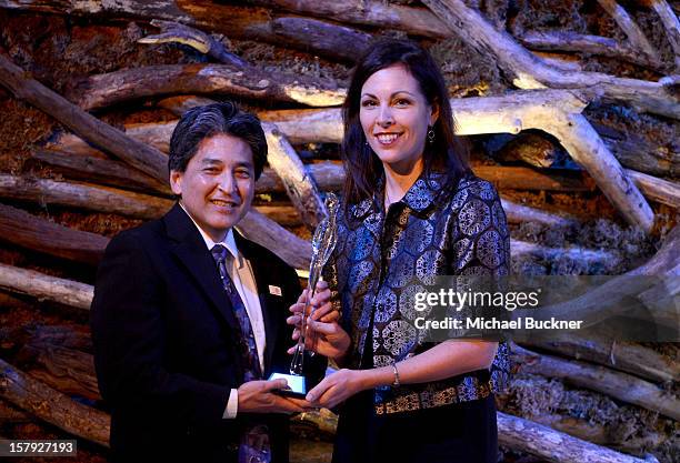 Honoree Bryan Oshiro M.D. Accepts the Elaine Whitelaw Volunteer Service Award from Karyn DeMartini, State Director of March of Dimes California...