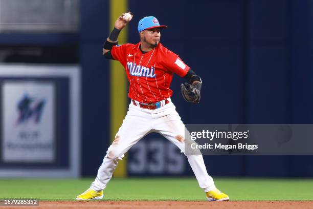 Luis Arraez of the Miami Marlins throws to first base for an out against the Detroit Tigers during the third inning at loanDepot park on July 29,...