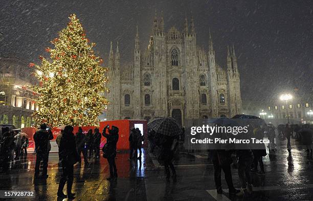 The Christmas tree under the snow in Duomo square on December 7, 2012 in Milan, Italy.