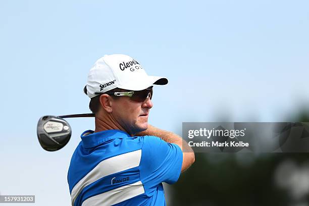 Scott Laycock of Australia plays a tee shot during round three of the 2012 Australian Open at The Lakes Golf Club on December 8, 2012 in Sydney,...