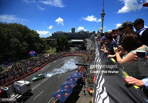 Dan Woolhouse of New Zealand competes in the Red Bull Drift Shifters along Victoria Street on December 8, 2012 in Auckland, New Zealand.