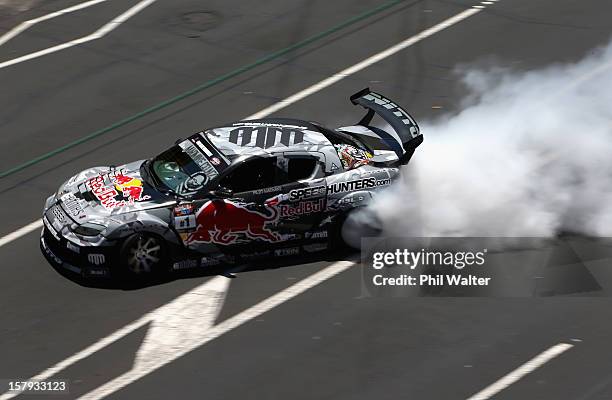 Mike Whiddett of New Zealand competes in the Red Bull Drift Shifters along Victoria Street on December 8, 2012 in Auckland, New Zealand.