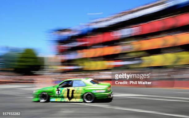 Cole Armstrong of New Zealand competes in the Red Bull Drift Shifters along Victoria Street on December 8, 2012 in Auckland, New Zealand.