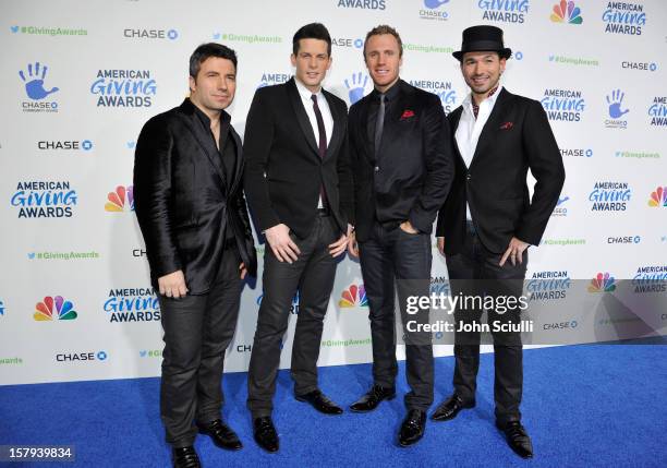 Musicians Remigio Pereira, Victor Micallef, Fraser Walters and Clifton Murray of the Canadian Tenors arrive at the American Giving Awards presented...