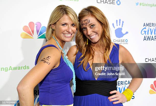 More Than Me" foundation founder Katie Meyler and guest arrive at the American Giving Awards presented by Chase held at the Pasadena Civic Auditorium...
