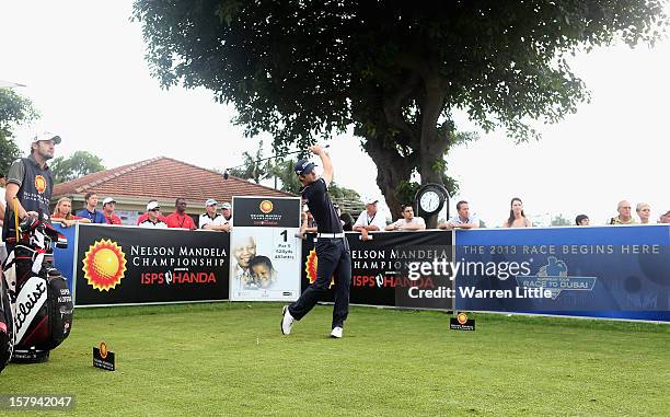 Espen Kofstad of Norway tees off on the first hole to start the 2013 Race To Dubai during first round of The Nelson Mandela Championship presented by...