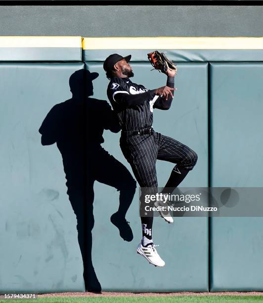 Luis Robert Jr. #88 of the Chicago White Sox catches a fly ball by Josh Bell of the Cleveland Guardians during the second inning at Guaranteed Rate...