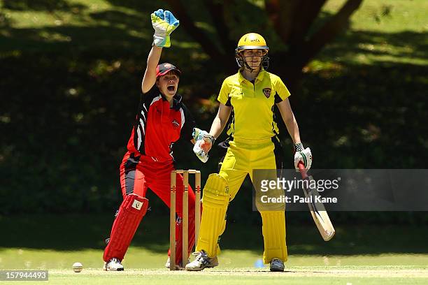 Tegan McPharlin of the Scorpions appeals for the wicket of Emma Biss of the Fury during the WNCL match between the Western Australia Fury and the...