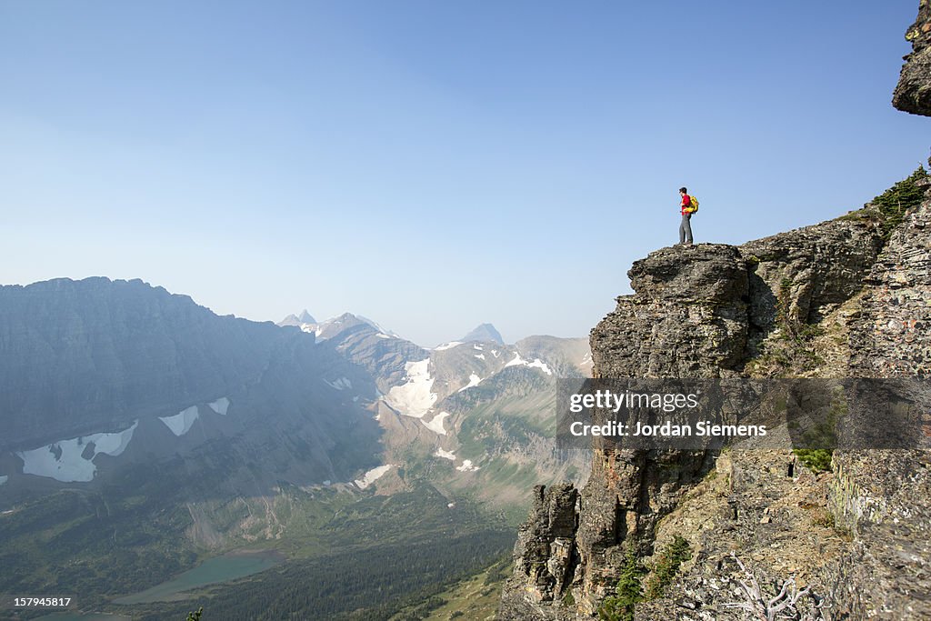 A male backpacking in the mountains.