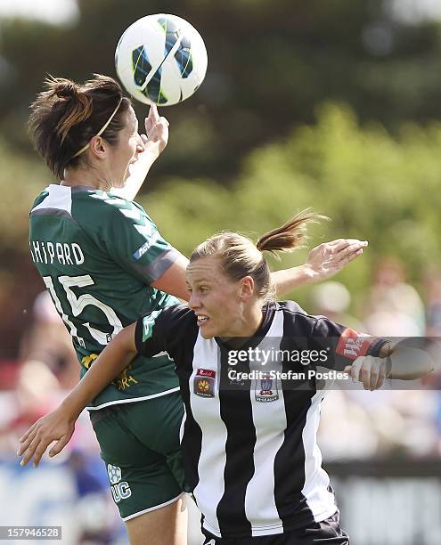 Sally Shipard of Canberra United and Emily Van Egmond of Newcastle Jets compete for a high ball during the round eight W-League match between...