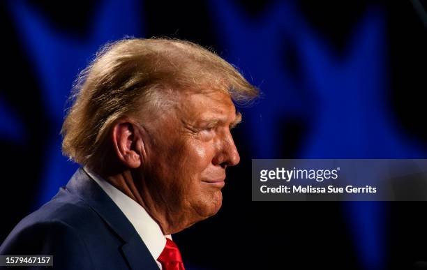 Former President Donald Trump pauses for cheers from the crowd before speaking as the keynote speaker at the 56th Annual Silver Elephant Dinner...