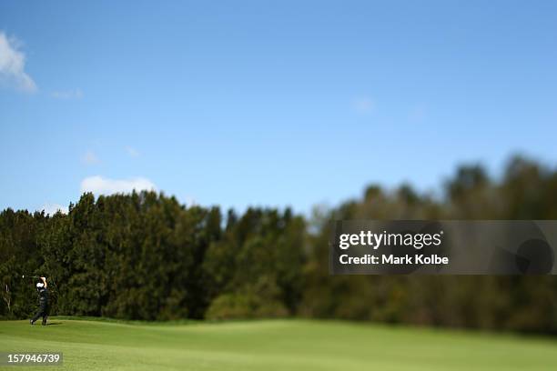 Matthew Goggin of Australia plays a fairway shot during round three of the 2012 Australian Open at The Lakes Golf Club on December 8, 2012 in Sydney,...