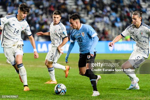 Franco Gonzalez of Uruguay plays against Gabriele Guarino of Italy during FIFA U-20 World Cup Argentina 2023 finals match between Italy and Uruguay...