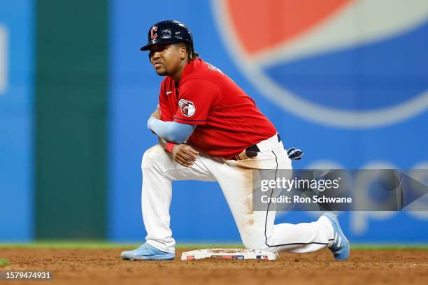 Jose Ramirez of the Cleveland Guardians waits on second base before being ejected for a fight with the Chicago White Sox during the sixth inning at...