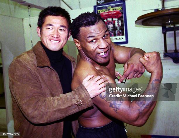 American boxer Mike Tyson with Japanese soccer star Kazuyoshi Miura in Las Vegas, Nevada, 9th January 2000. Tyson is training for his Jan 29 fight...