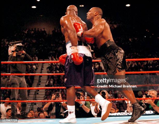American boxer Mike Tyson bites Evander Holyfield's right ear during a fight at the MGM Grand Hotel and Casino, Las Vegas, 28th June 1997.