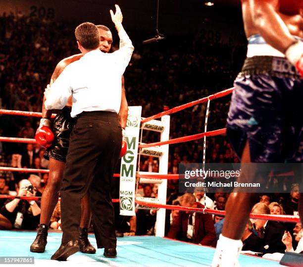 Mike Tyson v Evander Holyfield 1 in Las Vegas, Nevada, 9th November 1996. After a devastating punch from Holyfield at the end of the tenth Tyson...