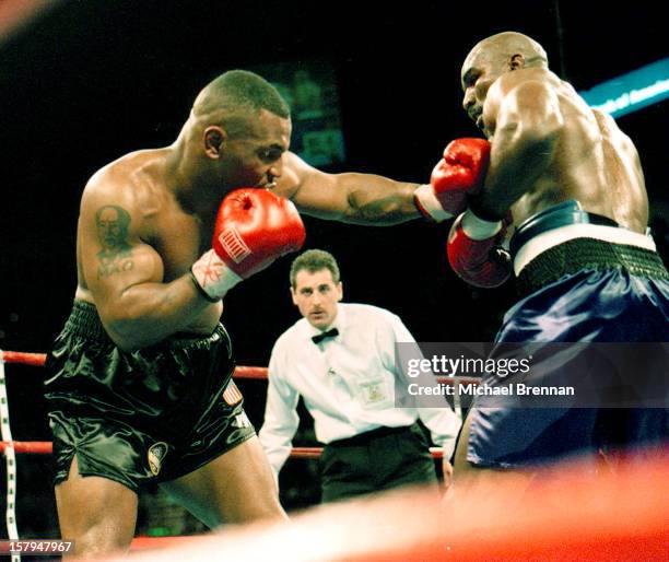 Mike Tyson v Evander Holyfield 1 in Las Vegas, Nevada, 9th November 1996. After a devastating punch from Holyfield Tyson barely made it out for the...