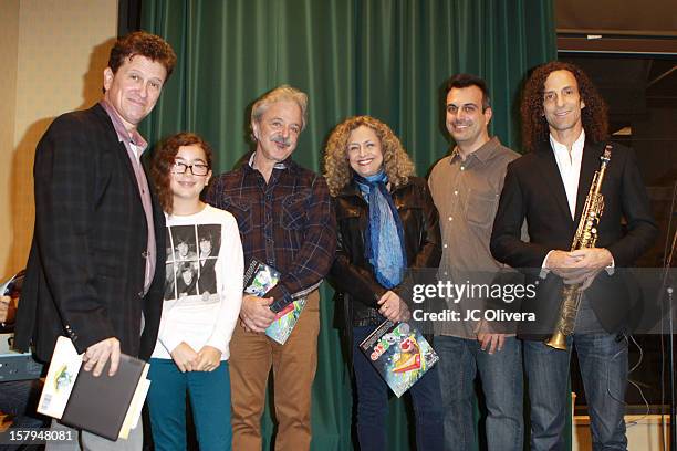 Kenny G, Greg Boghosian, Jeannie Elias, Jim Cunnings and Haden Ryan-Embry attend a live Interactive reading event of 'ELFBOT' inside Barnes & Noble...