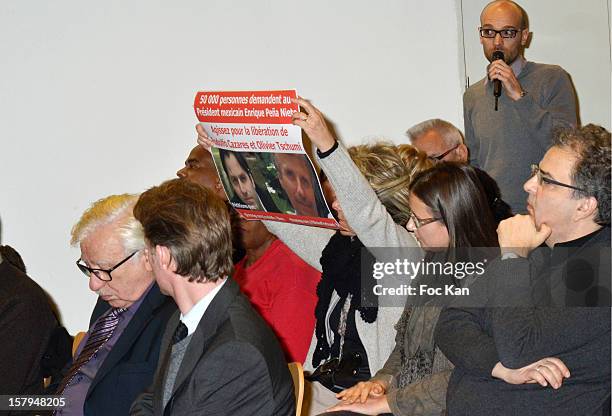 Members of hostage Olivier Tschumi family attend the 'Soutien A Tous Les Otages Du Monde' Press Conference at Hotel de Ville on December 7, 2012 in...