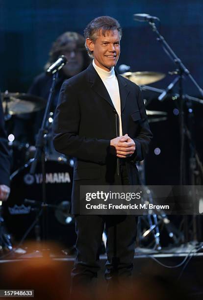 Singer Randy Travis performs onstage at the American Giving Awards presented by Chase held at the Pasadena Civic Auditorium on December 7, 2012 in...