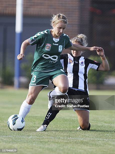 Georgia Yeoman-Dale of Canberra United and Alisha Foote of Newcastle Jets contest possession during the round eight W-League match between Canberra...