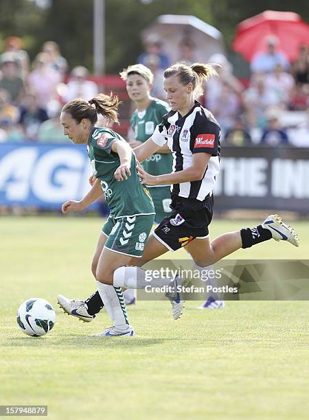 Emily Van Egmond of Newcastle Jets puts pressure on Jennifer Bisset of Canberra United during the round eight W-League match between Canberra United...