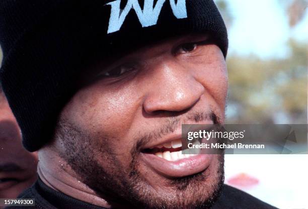 Boxer Mike Tyson leaves The Golden Gloves Gym after a strenuous training session prior to a fight with Bruce Seldon at the MGM Grand Hotel and Casino.