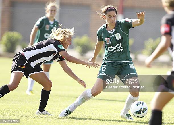 Caitlin Munoz of Canberra United and Gema Simon of Newcastle Jets contest possession during the round eight W-League match between Canberra United...