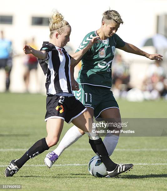 Michelle Heyman of Canberra United and Hannah Brewer of Newcastle Jets contest possession during the round eight W-League match between Canberra...