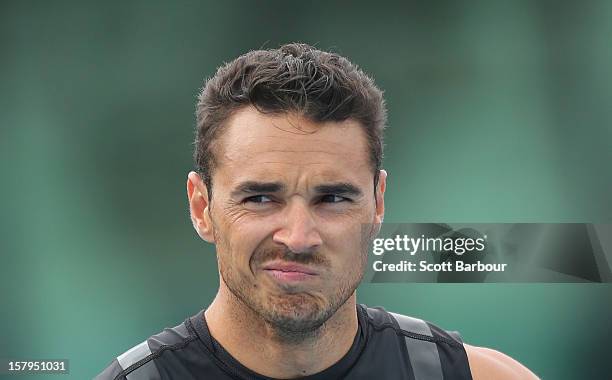 Josh Ross of Victoria looks on before competing in the Men's 100 Yards Open during the Zatopek Classic at Lakeside Stadium on December 8, 2012 in...