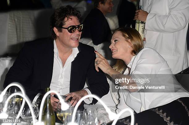 Arpad Busson and Uma Thurman attend a private dinner celebrating Remo Ruffini and Moncler's 60th Anniversary during Art Basel Miami Beach on December...