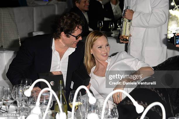 Arpad Busson and Uma Thurman attend a private dinner celebrating Remo Ruffini and Moncler's 60th Anniversary during Art Basel Miami Beach on December...