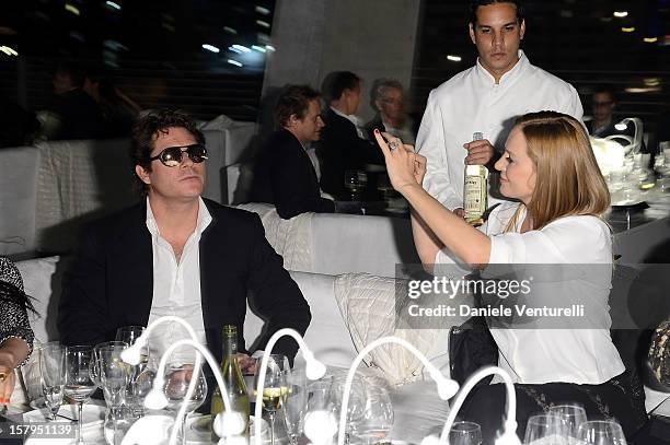 Arpad Busson and Uma Thurman attend a private dinner celebrating Remo Ruffini and Moncler's 60th Anniversary during Art Basel Miami Beach on December...