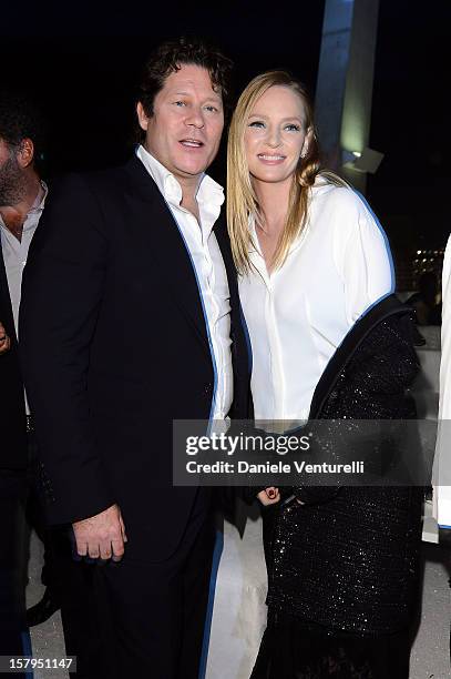 Arpad Busson and Uma Thurman attend a private dinner celebrating Remo Ruffini and Moncler's 60th Anniversary during Art Basel Miami Beach on December...