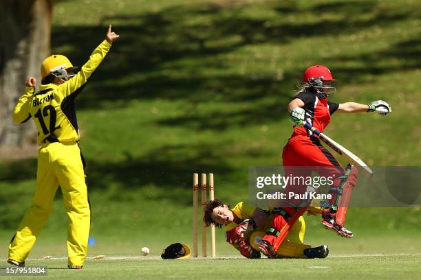 Bridget Patterson of the Scorpions collides with Jenny Wallace of the Fury after being run out during the WNCL match between the Western Australia...