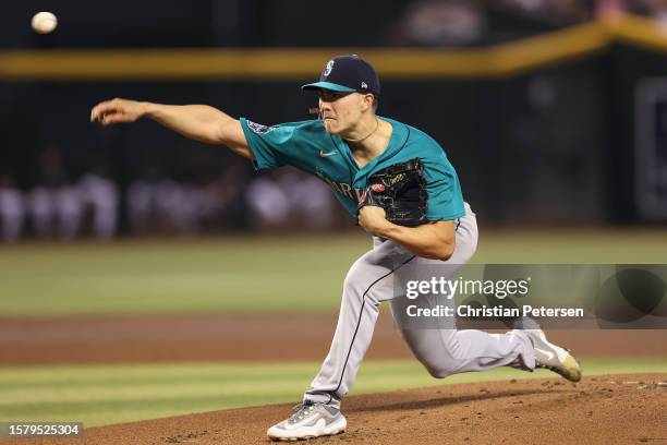 Starting pitcher Bryan Woo of the Seattle Mariners pitches against the Arizona Diamondbacks during the first inning of the MLB game at Chase Field on...