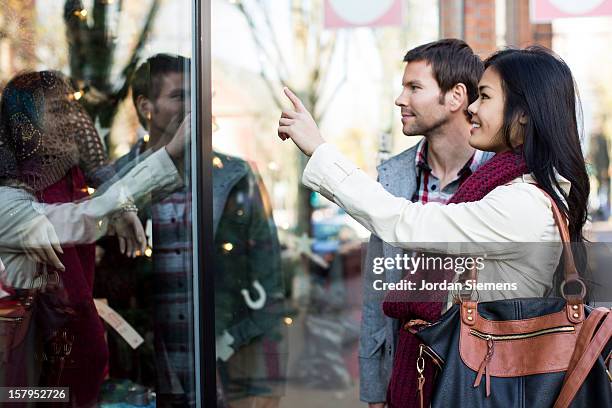 window shopping. - portland oregon christmas stock pictures, royalty-free photos & images