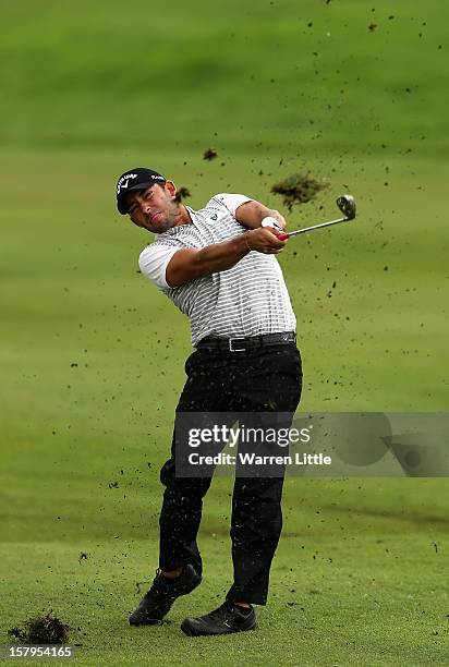 Pablo Larrazabal of Spain plays his second shot into the 17th green during the first round of The Nelson Mandela Championship presented by ISPS Handa...