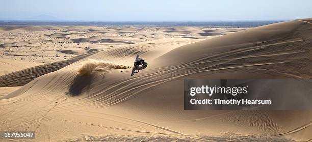 off highway vehicle/ohv enthusiast on the dunes - dune buggy stock pictures, royalty-free photos & images