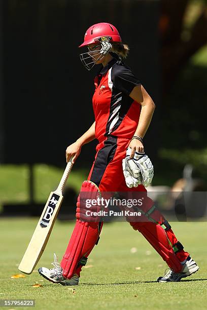 Lauren Ebsary of the Scorpions walks back to the rooms after being dismissed during the WNCL match between the Western Australia Fury and the South...
