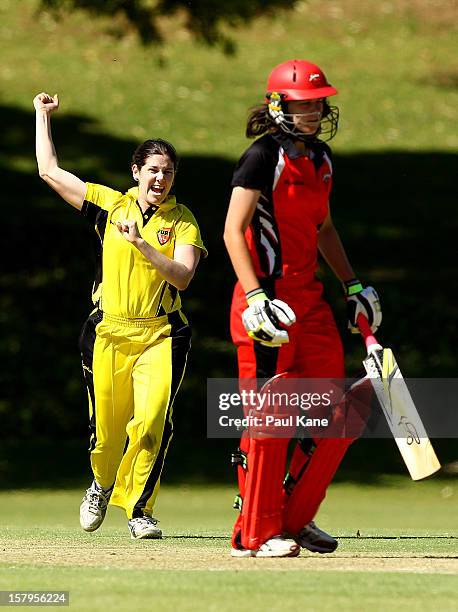 Emma Biss of the Fury celebrates dismissing Beth Morgan of the Scorpions during the WNCL match between the Western Australia Fury and the South...