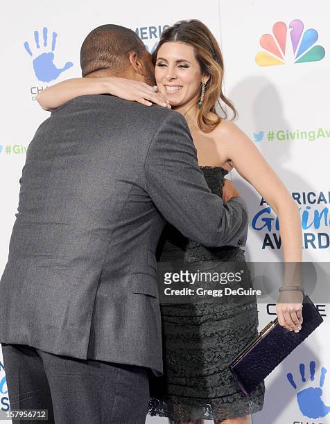 Actors Anthony Anderson and Jamie-Lynn Sigler arrive at the 2nd Annual American Giving Awards at the Pasadena Civic Auditorium on December 7, 2012 in...