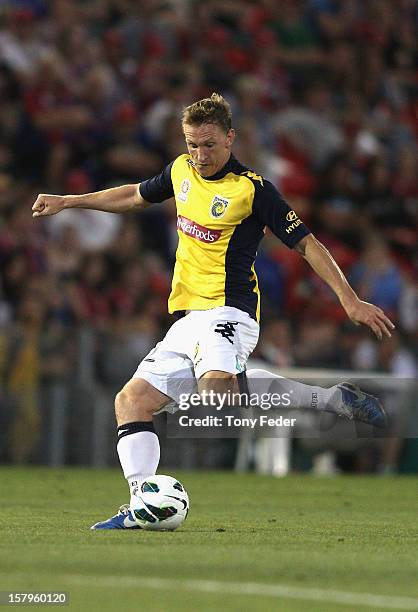 Daniel McBreen of the Mariners takes a shot at goal during the round ten A-League match between the Newcastle Jets and the Central Coast Mariners at...