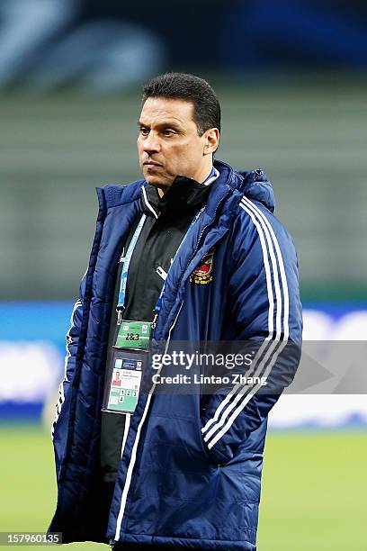 Egyptian football club team Al Ahly head coach Hossam El-Badry looks on during the Al Ahly training session at Toyota Stadium on December 8, 2012 in...