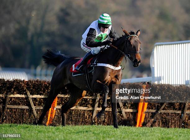 Barry Geraghty riding Golden Hoof clear the last to win John Oakley 50th Birthday 'National Hunt' Novices' Hurdle at Sandown racecourse on December...