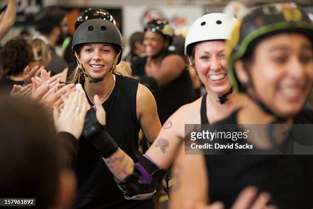 after a roller derby bout appreciation - roller derby stock pictures, royalty-free photos & images