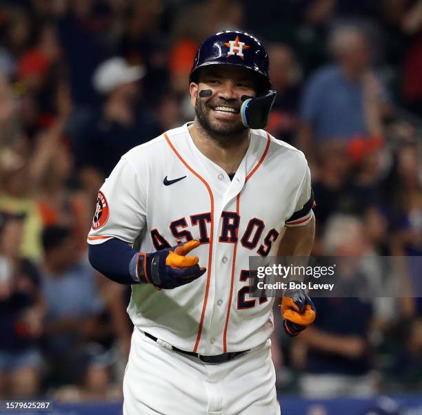 Jose Altuve of the Houston Astros hits a home run in the seventh inning against the Tampa Bay Rays at Minute Maid Park on July 29, 2023 in Houston,...