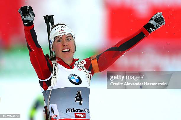 Synnoeve Solemdal of Norway celebrates winning the women's pursuit event during the IBU Biathlon World Cup on December 8, 2012 in Hochfilzen,...