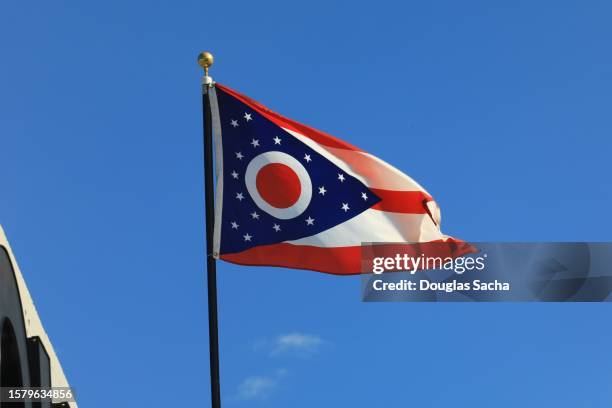 state flag of ohio on display - ohio flag stock pictures, royalty-free photos & images